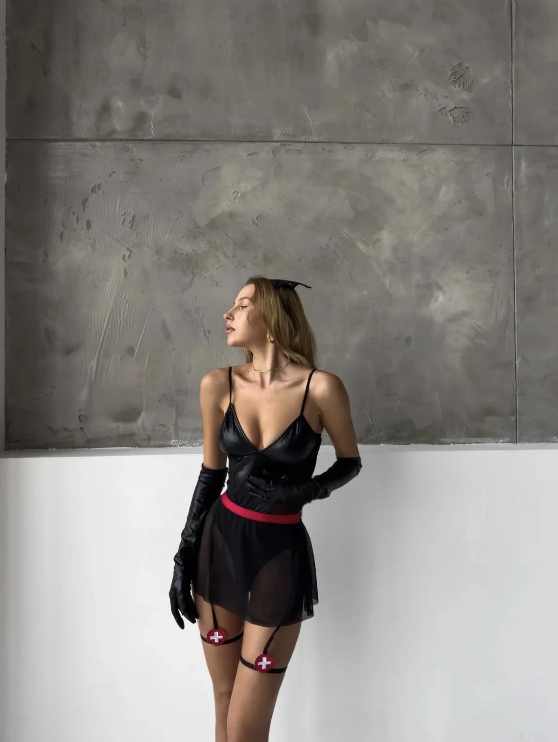 Black Costume with Leather Details